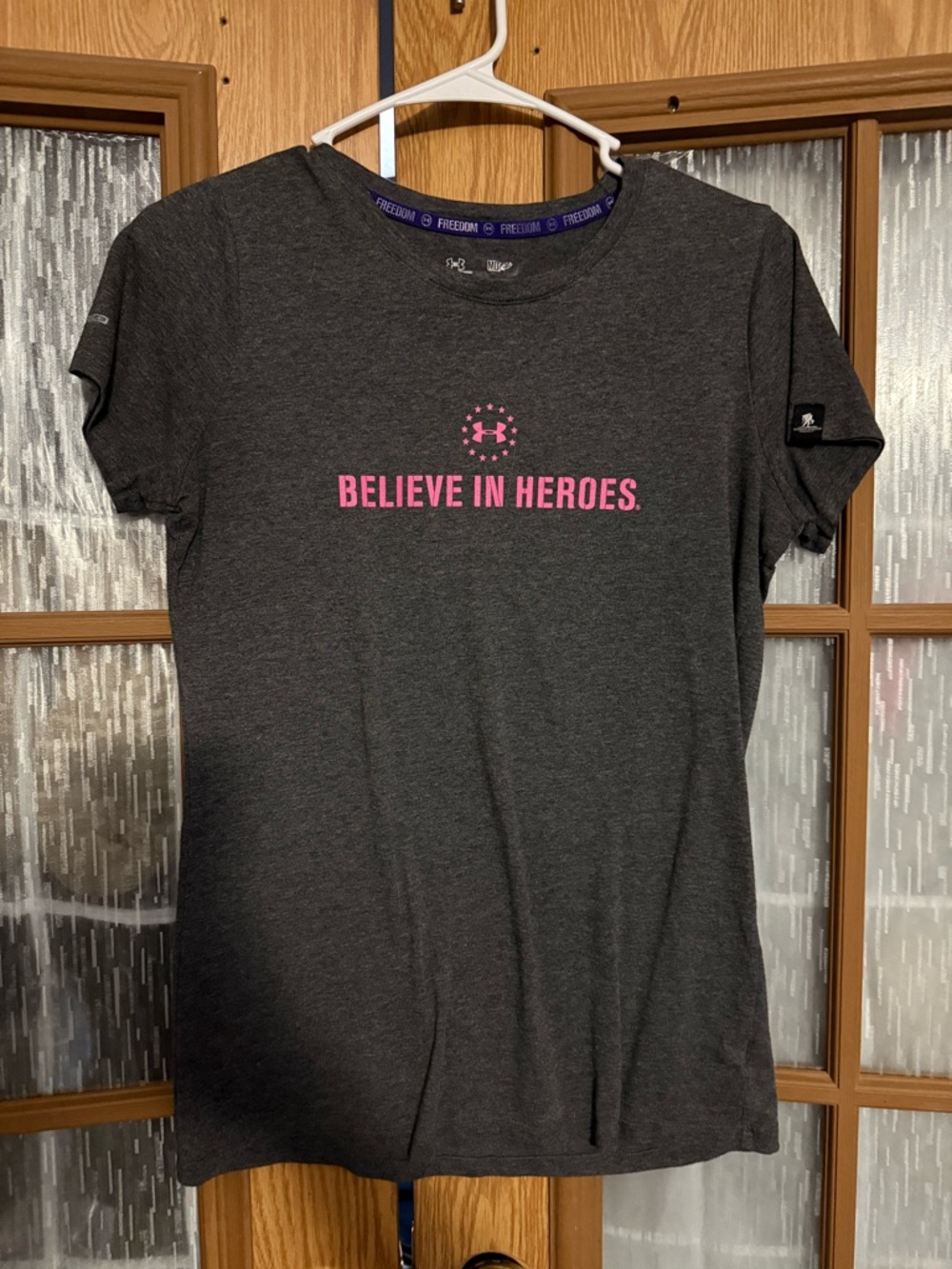 Under Armour Charcoal Short Sleeve Tee with Pink 'Believe in Heroes' Logo